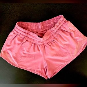 Size 4 Lululemon Hotty Hot low rise lined shorts 2.5” inseam.